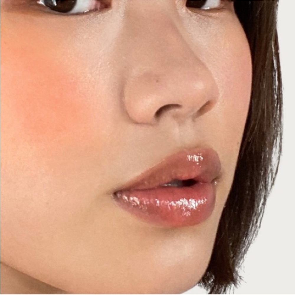 Nearly neutral Rare Beauty stay vulnerable glossy lip balm
